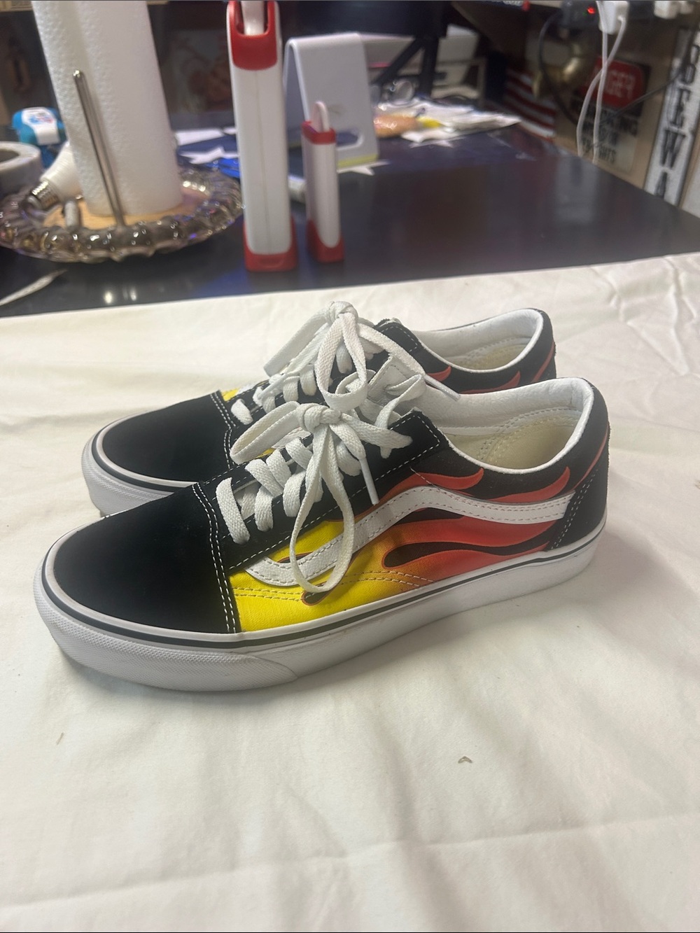 Vans Black Low-Top Sneakers with Yellow-Orange-Red Flame Graphic